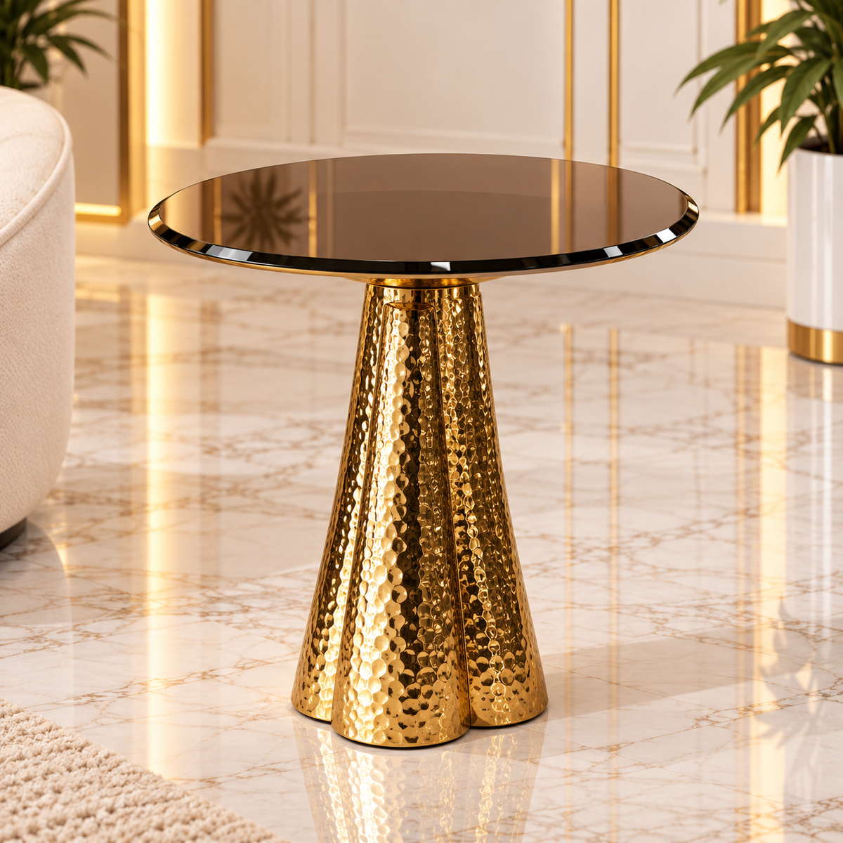 Aurelio side table with a dark reflective round top and textured gold-tone pedestal base